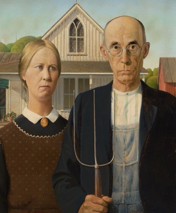 A farmer and his daughter stand before their Iowa house.