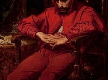 His clasped hands hold his tension in check.