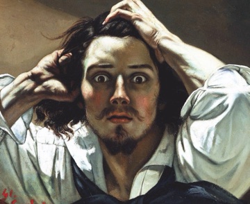 Courbet stares straight out of the frame.
