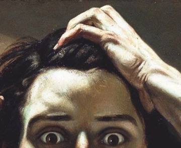 His brightly lit forehead is framed by hair and raised hands.