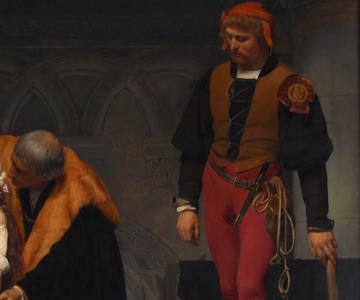 The executioner waits to the right of the group.