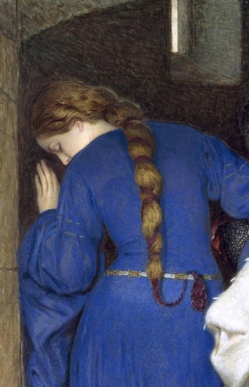 Her long braid falls over the blue dress.
