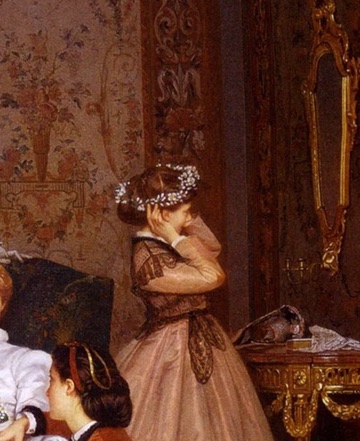 A girl tries on orange blossoms beside the mirror.